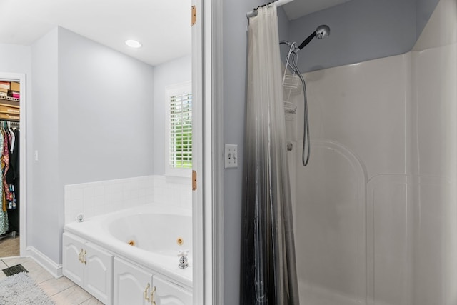 662 Nance Springs Rd, Dalton, GA 30721 - full bath with a shower stall, a jetted tub, and a spacious closet