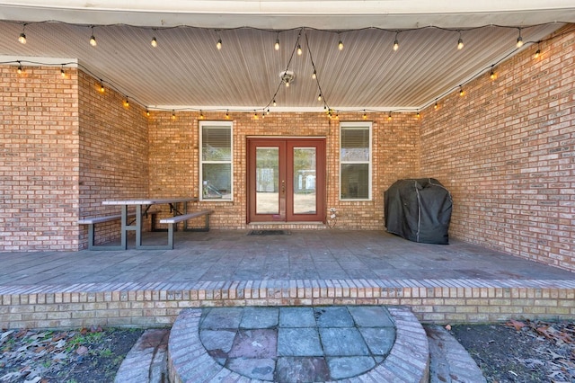 doorway to property featuring french doors and a deck