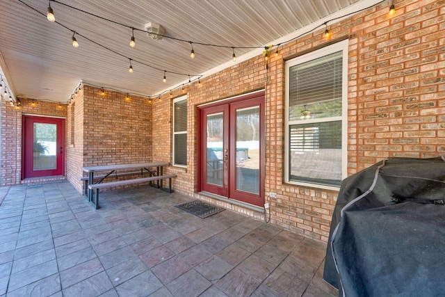 doorway to property with a patio and french doors