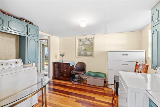 washroom featuring washer / clothes dryer and light wood-type flooring