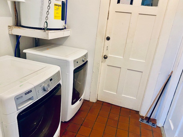 clothes washing area with independent washer and dryer