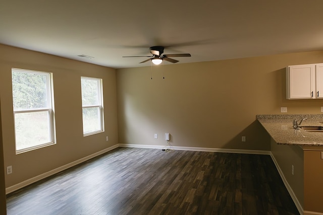 283 Parkland Way, Chatsworth, GA 30705 - unfurnished dining area featuring dark wood-style floors, a ceiling fan, and baseboards