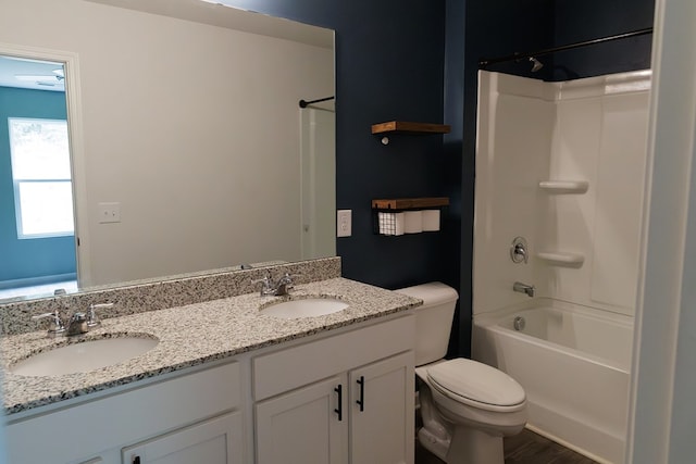 283 Parkland Way, Chatsworth, GA 30705 - full bath featuring double vanity, toilet,  shower combination, and wood finished floors