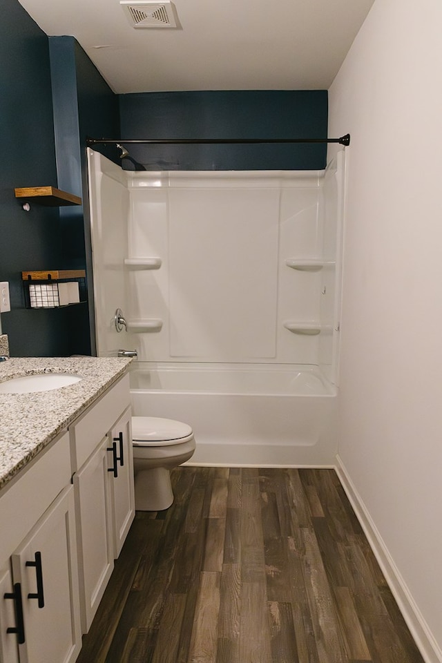 283 Parkland Way, Chatsworth, GA 30705 - bathroom with wood finished floors, vanity, toilet, and  shower combination