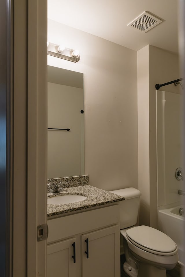 283 Parkland Way, Chatsworth, GA 30705 - bathroom featuring vanity, toilet, and tub / shower combination