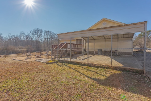 view of yard with a patio area and a deck