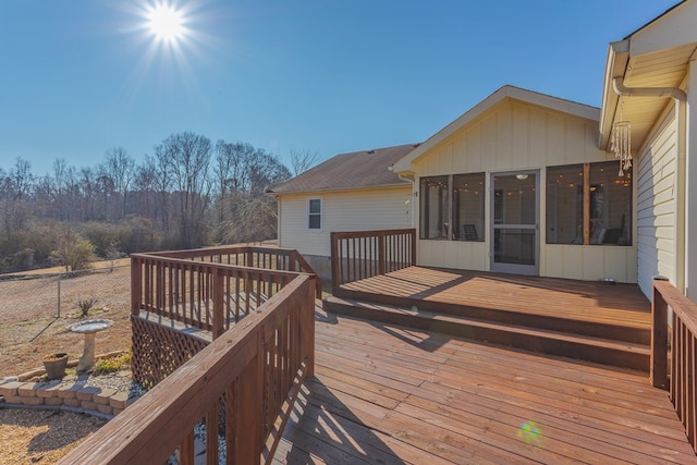 deck featuring a sunroom