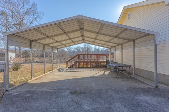 view of vehicle parking featuring a carport