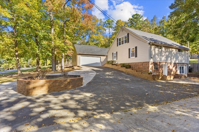 view of property exterior with a garage