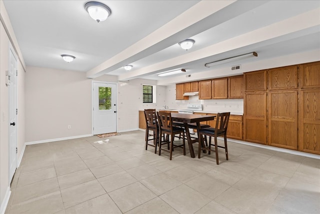 dining room with light tile patterned floors