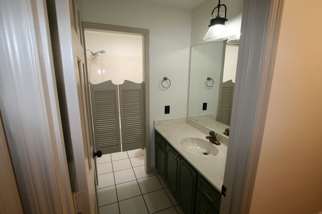 bathroom with vanity and tile patterned flooring