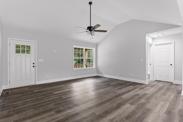 unfurnished living room with dark hardwood / wood-style flooring, vaulted ceiling, and ceiling fan