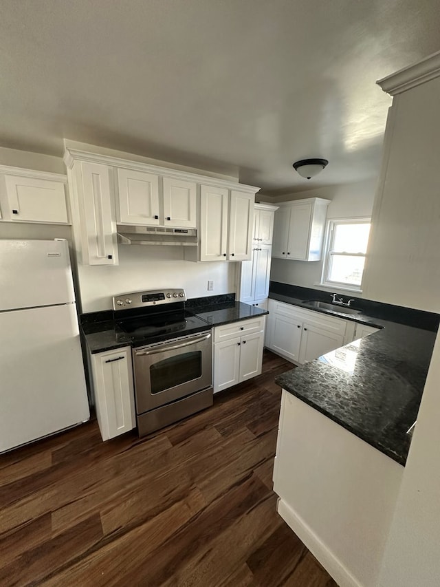 kitchen with electric stove, sink, white refrigerator, white cabinets, and dark hardwood / wood-style flooring