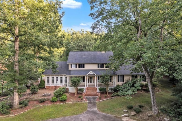 299 Charlotte Dr, Dalton, GA 30720 - view of front of home featuring a porch, stairs, a front lawn, and roof with shingles