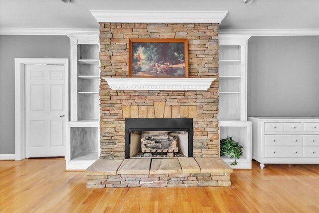 299 Charlotte Dr, Dalton, GA 30720 - living room with crown molding, wood finished floors, and a fireplace
