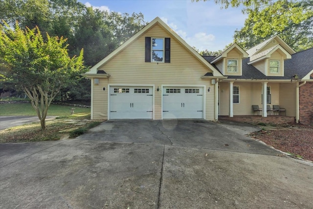 299 Charlotte Dr, Dalton, GA 30720 - view of front of property featuring driveway, a porch, and an attached garage