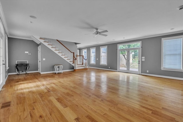 299 Charlotte Dr, Dalton, GA 30720 - unfurnished living room featuring stairs, ornamental molding, a ceiling fan, and light wood finished floors
