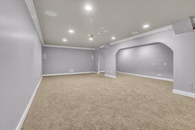 299 Charlotte Dr, Dalton, GA 30720 - below grade area with crown molding, arched walkways, carpet flooring, and recessed lighting