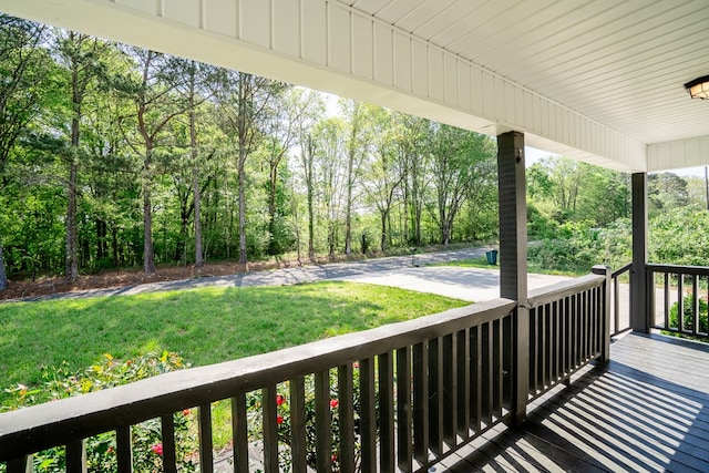2549 Prospect Rd, Dalton, GA 30721 - wooden deck featuring a porch and a lawn