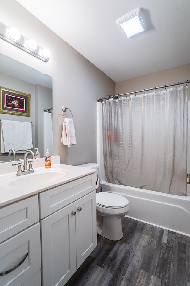 2549 Prospect Rd, Dalton, GA 30721 - full bathroom featuring wood finished floors, visible vents, toilet, vanity, and shower / tub combo