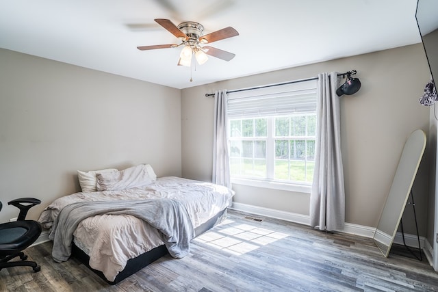 2549 Prospect Rd, Dalton, GA 30721 - bedroom featuring wood finished floors, baseboards, and ceiling fan