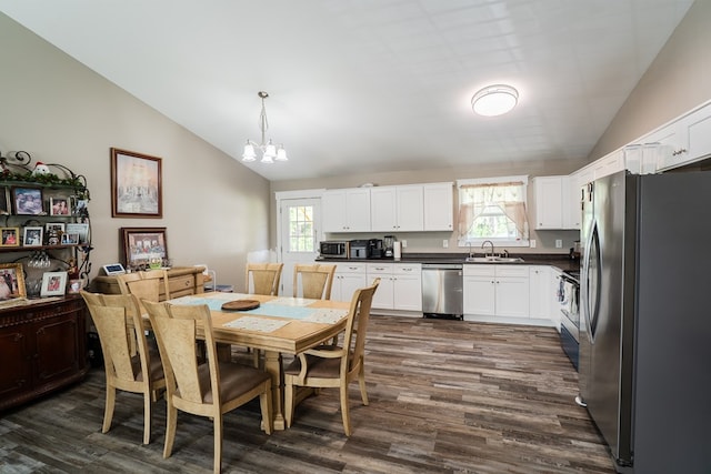 2549 Prospect Rd, Dalton, GA 30721 - dining area with a chandelier, dark wood finished floors, and lofted ceiling