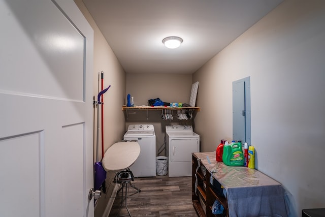 2549 Prospect Rd, Dalton, GA 30721 - washroom with wood finished floors, electric panel, washer and dryer, and laundry area