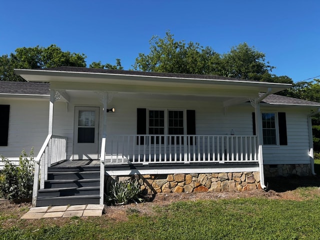 19 5th Ave, Eton, GA 30705 - view of front facade with covered porch and roof with shingles
