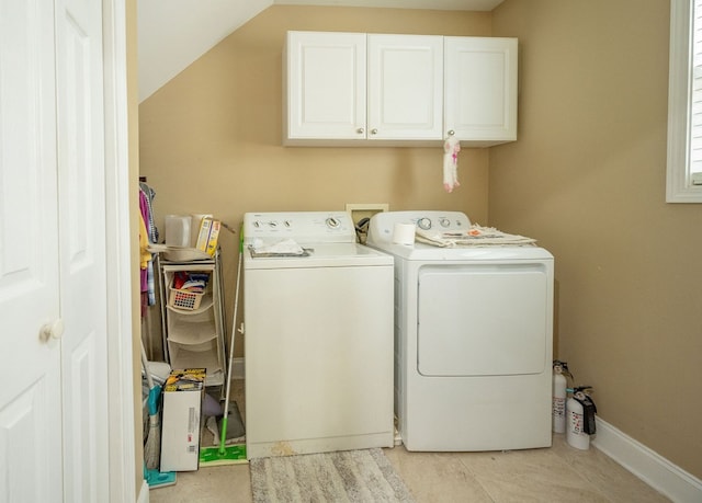 1730 Brighton Way, Dalton, GA 30720 - washroom with cabinet space, washer and dryer, baseboards, and light tile patterned flooring