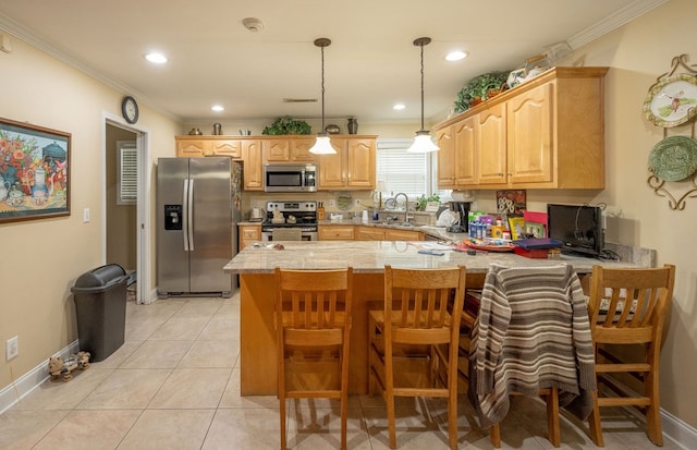 1730 Brighton Way, Dalton, GA 30720 - kitchen featuring appliances with stainless steel finishes, a sink, a peninsula, ornamental molding, and hanging light fixtures