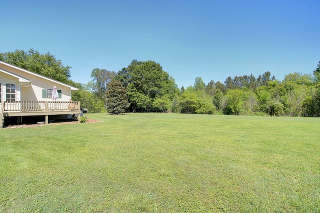 view of yard featuring a deck