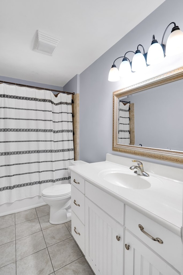 full bathroom with vanity, tile patterned floors, toilet, and shower / bath combo