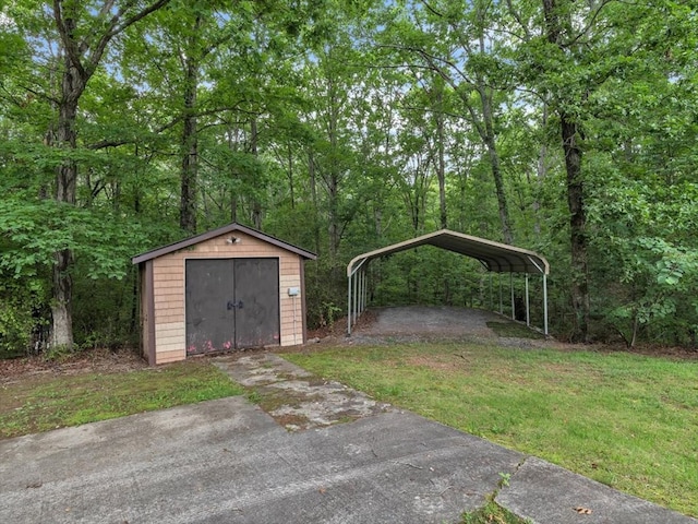 view of green lawn with a storage unit, an outbuilding, and a detached carport