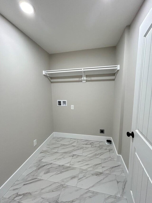 kitchen with sink, stainless steel appliances, white cabinets, and light wood-type flooring