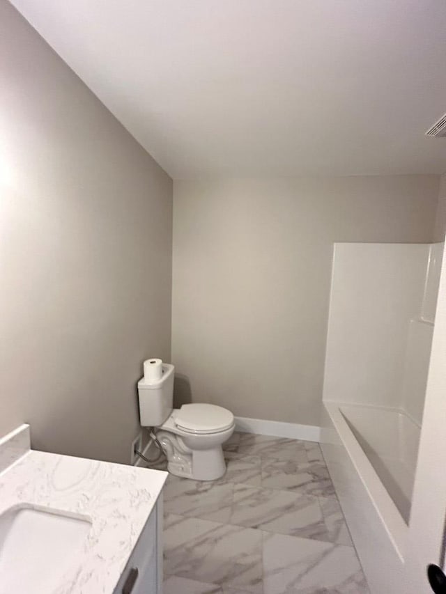 bathroom with vanity and toilet