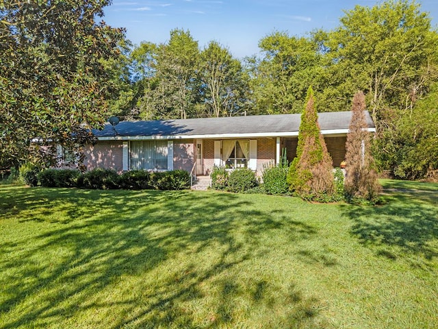 ranch-style house with a front yard