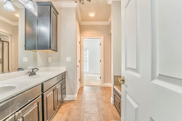 bathroom with ornamental molding, tile patterned floors, and vanity