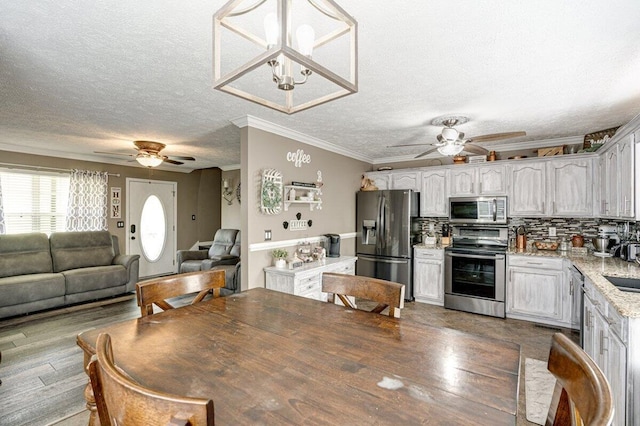 1359 Dustin Dr, Dalton, GA 30720 - dining area with a ceiling fan, wood finished floors, ornamental molding, and a textured ceiling