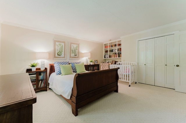 bedroom with light carpet, crown molding, and a closet