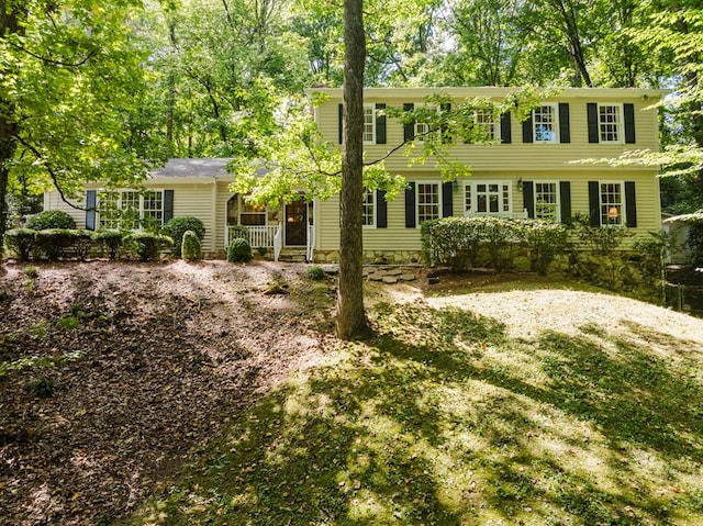 colonial house with a front yard