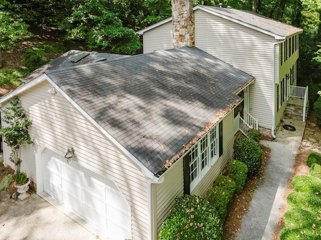 view of side of property featuring a garage