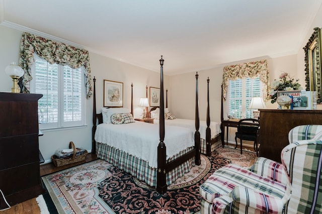 bedroom featuring hardwood / wood-style flooring and ornamental molding