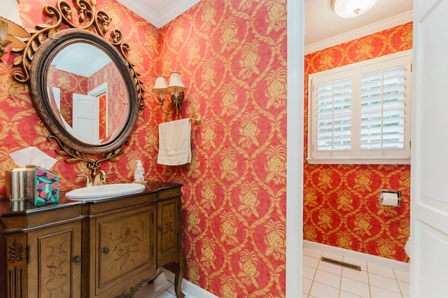 bathroom featuring vanity, ornamental molding, and tile patterned floors