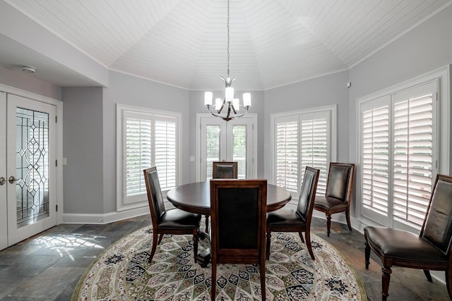 dining room with vaulted ceiling, ornamental molding, a notable chandelier, wood ceiling, and french doors