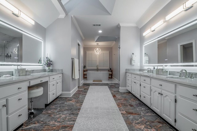 bathroom with crown molding and vanity