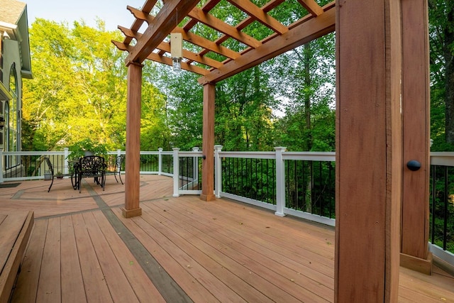 wooden terrace with a pergola