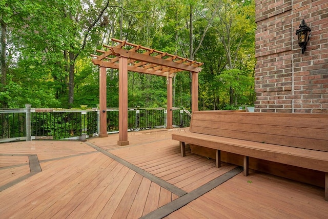 wooden terrace with a pergola