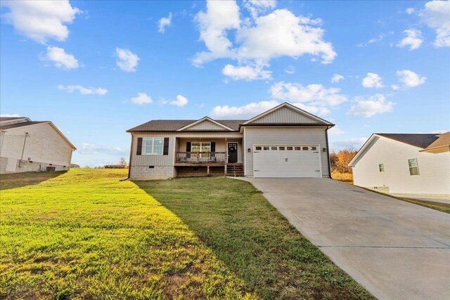 ranch-style house with a porch, a garage, and a front yard