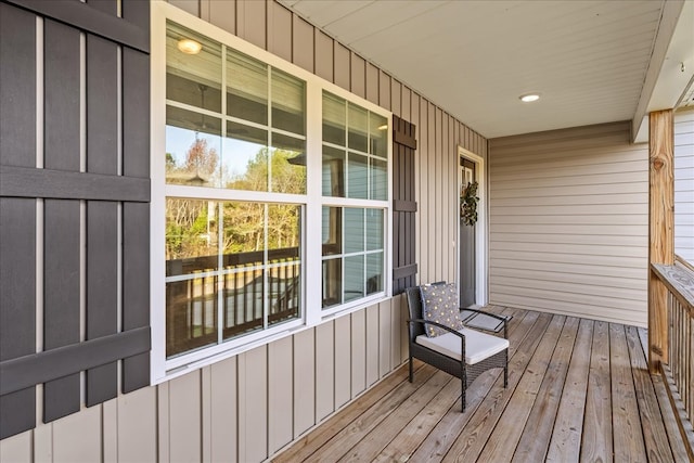 wooden deck featuring covered porch