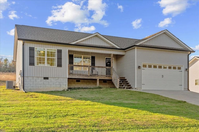 view of front of property featuring central AC unit, a garage, a front yard, and covered porch